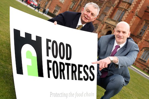 Professor Chris Elliott, right, from Queens University is delighted to launch the new branding for Food Fortress as 47 companies representing 99.9% of the animal feed trade in Northern Ireland are now participating in the scheme. Also included is Robin Irvine,  who is managing the scheme on behalf of the trade. Photograph: Columba O'Hare 